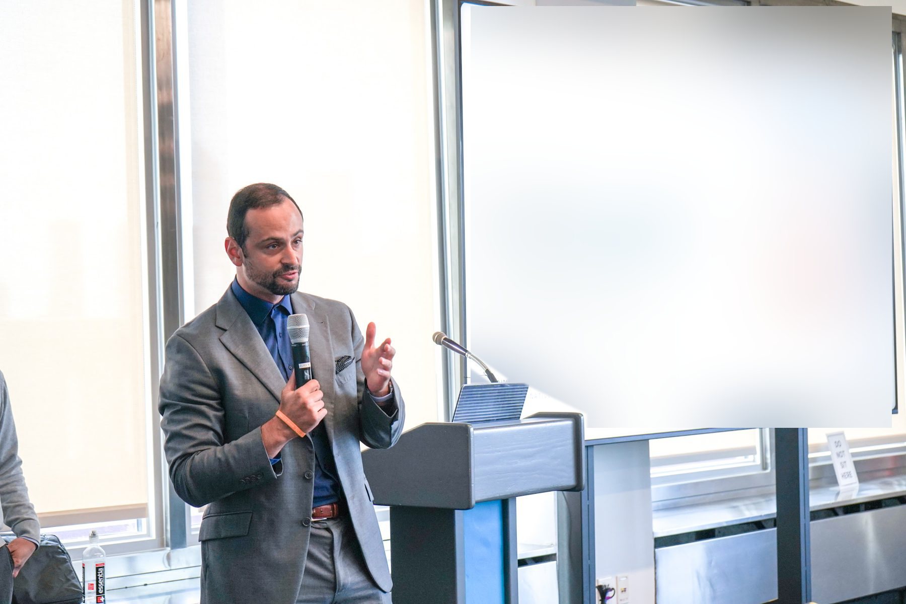David Caiafa presenting at a podium at Con Edison